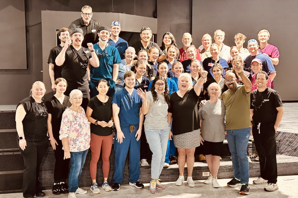 Dental students and other volunteers in temporary clinic in Puerto Rico.