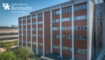 Exterior of College of Dentistry building with the College of Dentistry logo added in the top right corner of the photo.