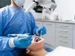 Endodontists working on a patient.
