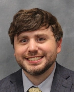 Dr. Travis McMaine