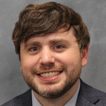Dr. Travis McMaine